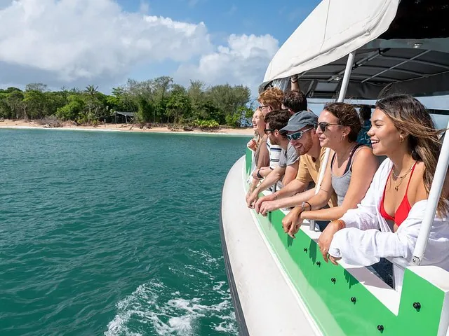 Passengers looking out from a boat at Frankland Islands